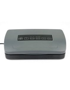 Vacuum sealer with bag dispenser